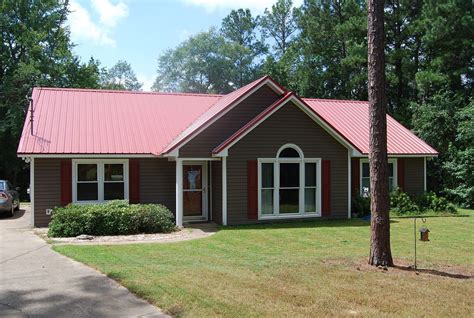 burgundy metal roof and red brick houses|pictures of brick house roofs.